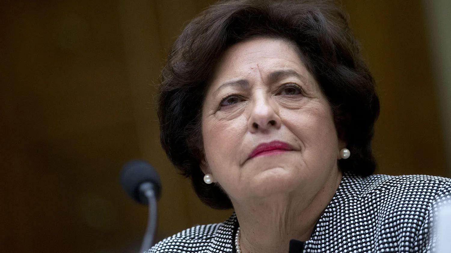 Katherine Archuleta, director of the U.S. Office of Personnel Management (OPM), listens during a House Oversight and Government Reform Committee hearing on the OPM data breach in Washington, D.C., U.S., on Wednesday, June 24, 2015. U.S. senators said yesterday they doubt the government's personnel office understands the breadth of a computer hack that exposed the records of more than 4 million federal workers, or that the agency can stop another breach.
