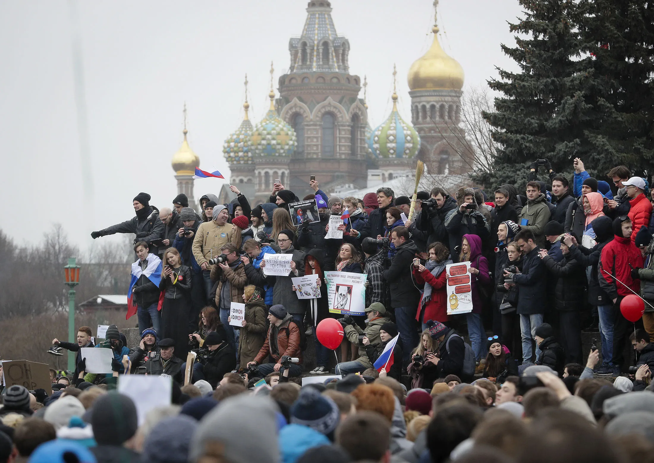 Protesters gather at Marsivo Field in St. Petersburg, Russia, on March 26, 2017.
