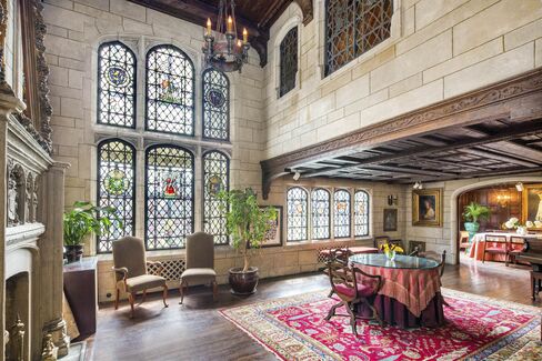 The living room, which boasts 17 foot ceilings.