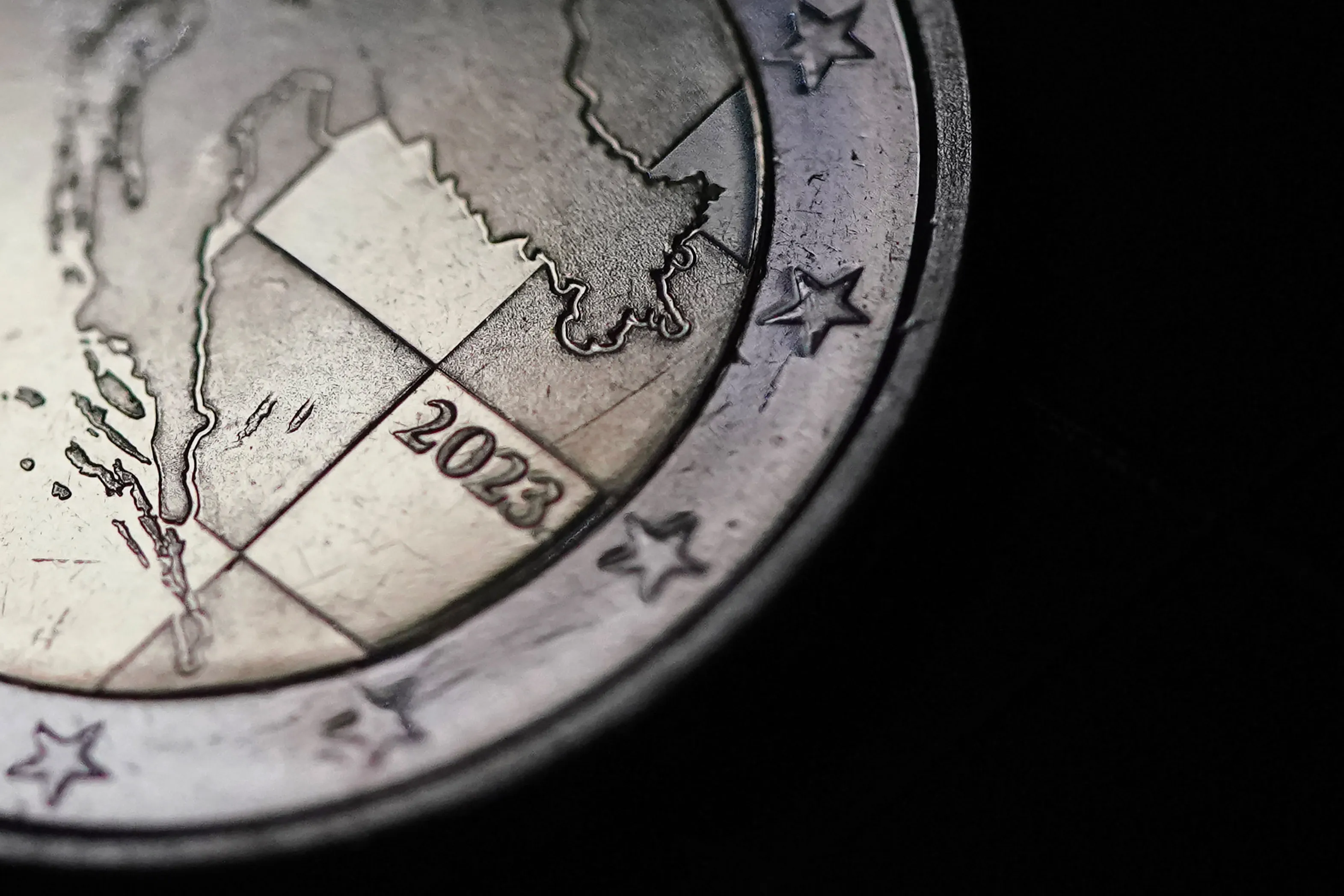 A detail of a map of Croatia on a newly pressed Croatian 2 euro coin at the mint in Zagreb