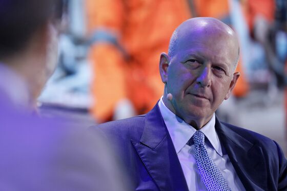 Goldman Gives Solomon, Blankfein Pay Packages With 1MDB Caveat