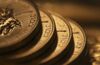 Canadian maple leafs on the faces of one ounce gold coins in London, U.K.