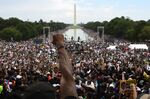 The &quot;Commitment March: Get Your Knee Off Our Necks&quot; protest against racism and police brutality at the Lincoln Memorial in Aug. 2020.