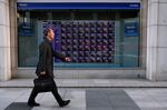 Japan Stocks Play Catch Up in Global Slump After Four-Day Break