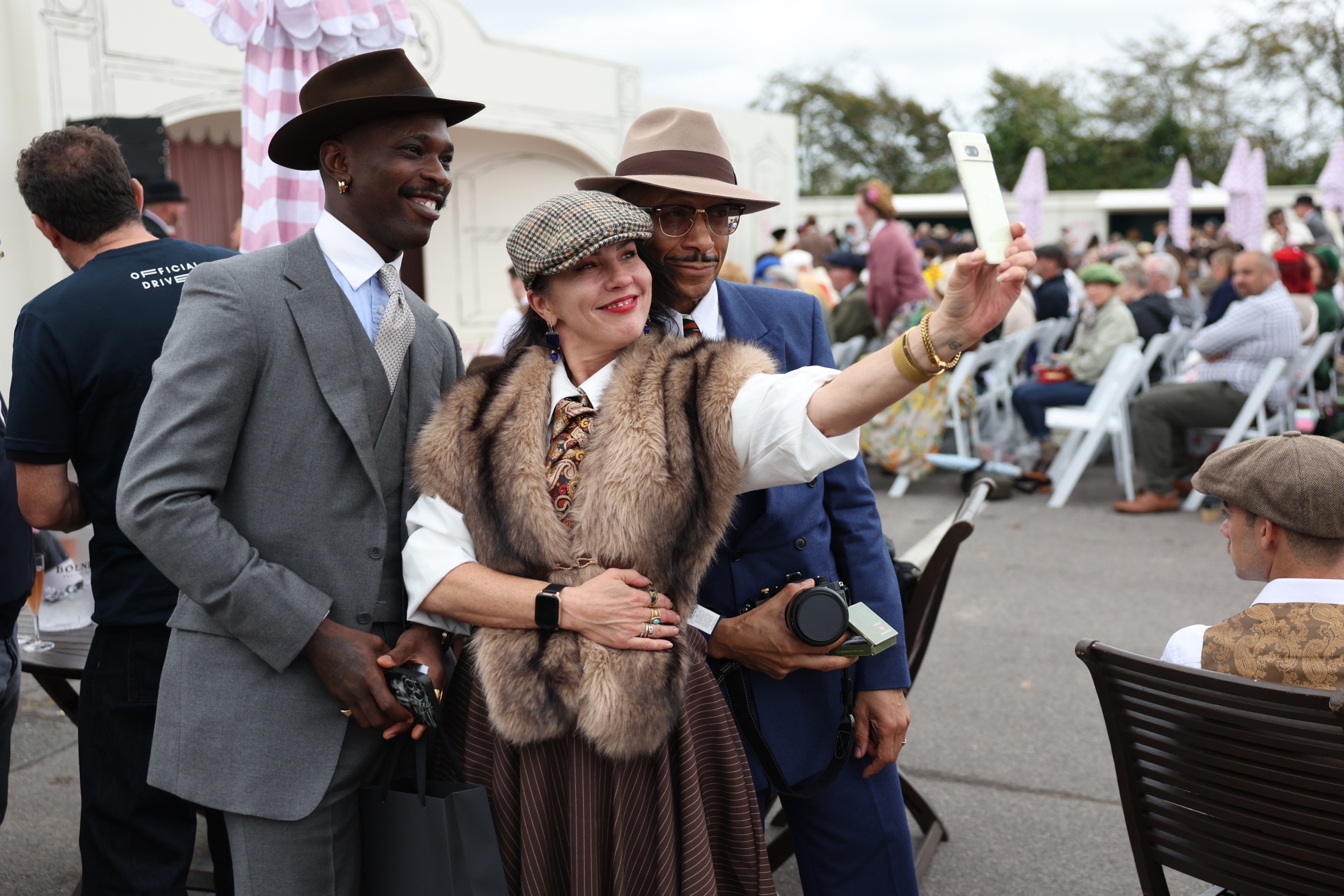 Racegoers in vintage fashion on day two of Goodwood Revival presented by Dunlop at the Goodwood Motor Circuit in Chichester, West Sussex. Picture date: Saturday September 19, 2026. Photographer: Kieran Cleeves/PA Media Assignments