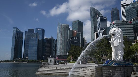 Singapore’s Economy Plunges in Early Sign of Pain in Asia