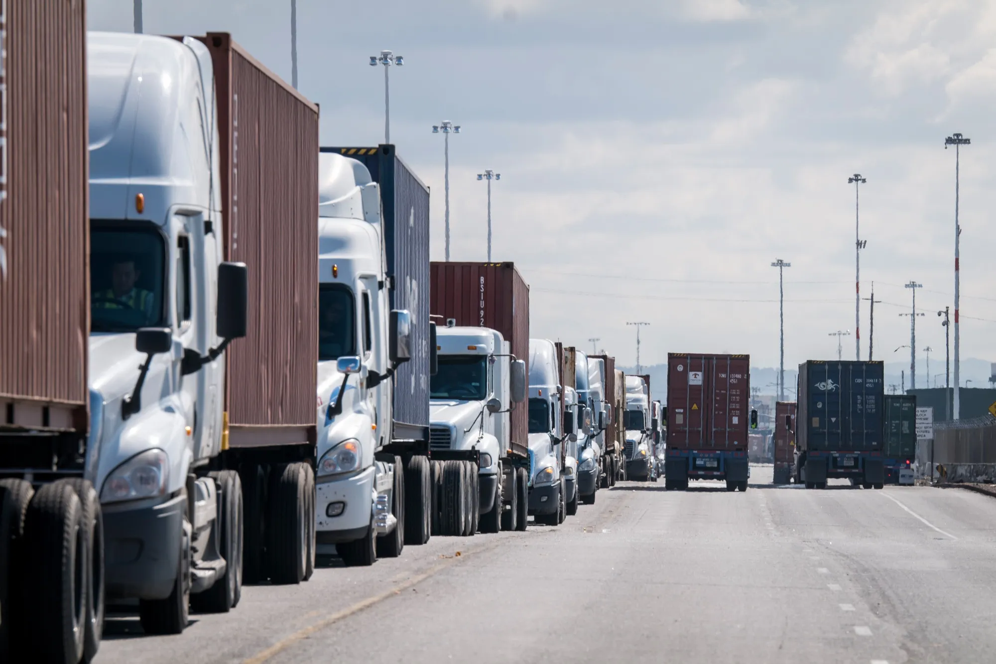 Trucks wait in line to enter the Port of Oakland last week.