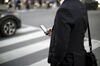 Commuters On Bay Street As Canadian Stocks Mixed