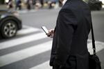 Commuters On Bay Street As Canadian Stocks Mixed