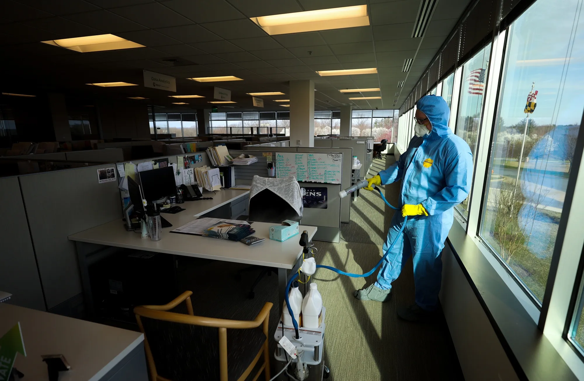 Workers&nbsp;disinfect&nbsp;at an office building&nbsp;in&nbsp;Maryland on March 21.
