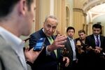 Senate Majority Leader Chuck Schumer, a Democrat from New York, center, speaks to members of the media at the U.S. Capitol in Washington, D.C.