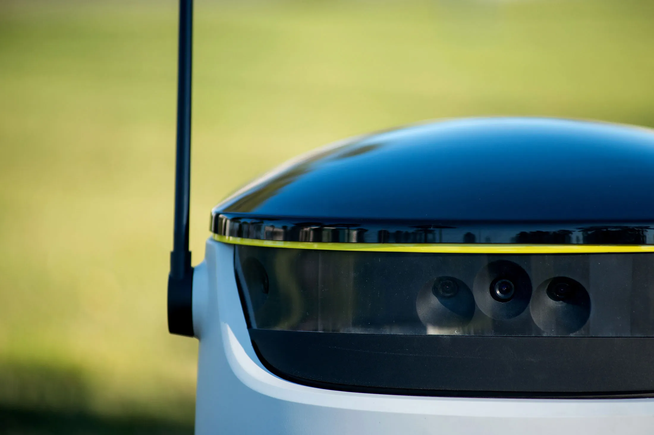 A radio antenna and camera units sit on a prototype self driving parcel delivery robot, developed by Starship Technologies, during testing in a residential district of Tallinn, Estonia, on Tuesday, April 12, 2016. The electric-powered robots intend to help short-range low cost deliveries and ultimately aim to make the local delivery of goods free.
