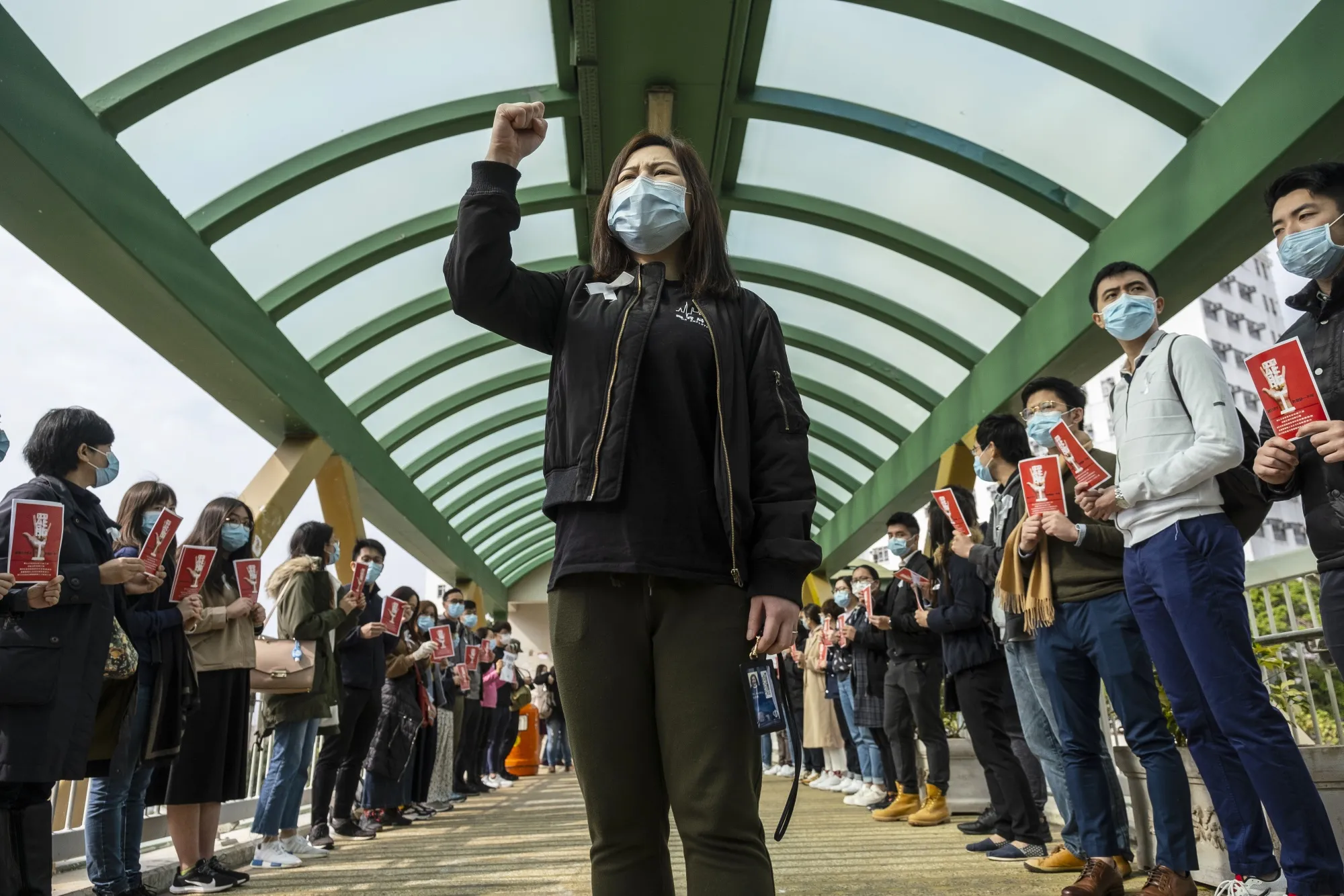 Medical workers wearing protective masks&nbsp;protest outside Queen Mary Hospital in Hong Kong on&nbsp;Feb. 3.&nbsp;