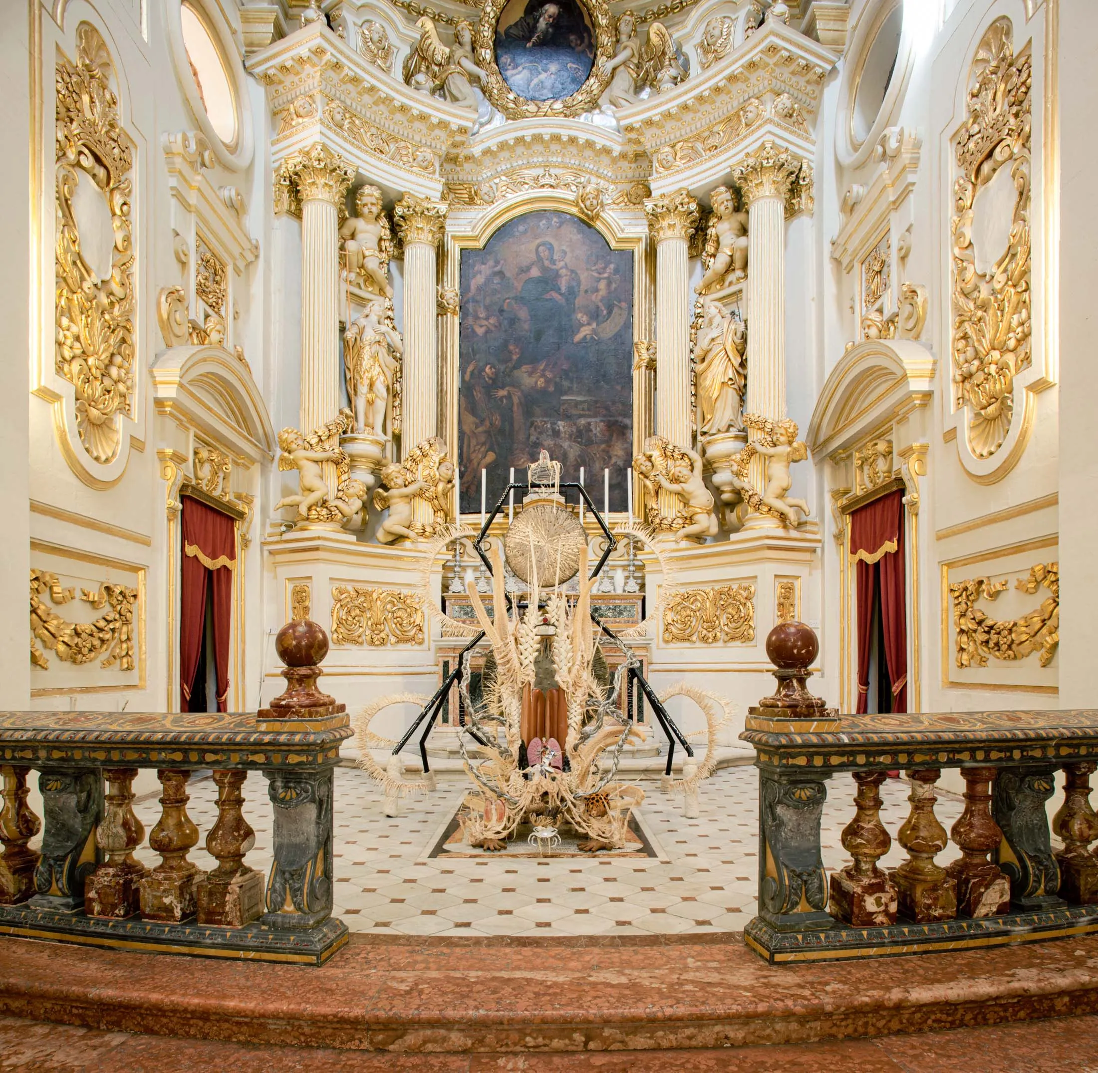 Guadalupe Maravilla’s&nbsp;Disease Thrower:&nbsp;Purring Monster With a Mirror on Its Back&nbsp;(2022), installed in the Tal-Pilar Church in Valletta, Malta.