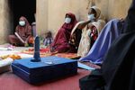 Women gathered at a village on the outskirts of Kano, northern Nigeria, for a discussion on family planning.
