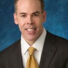 Headshot of Dr Russell L Holman "Rusty"