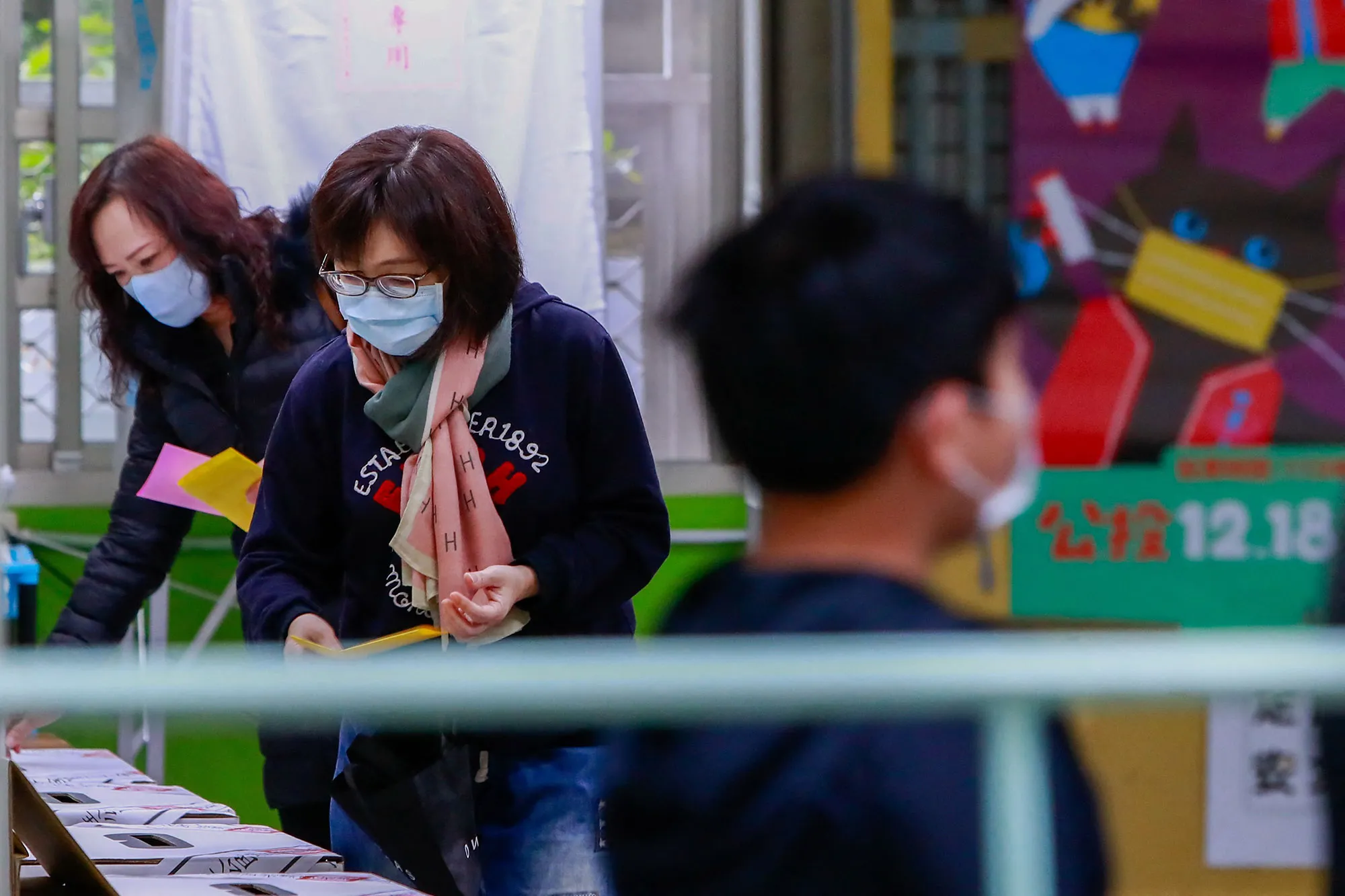 People cast their votes during a referendum at a voting station in Taipei on Dec.&nbsp;18,&nbsp;