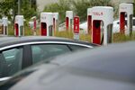 While California utilities await approval for their charging station buildout, Tesla is busy installing Supercharger stations in cities. By the end of next year, it plans to have more than 1,000 in California, like this one in San Diego.