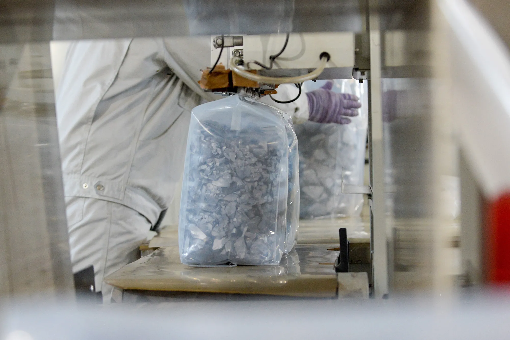 Products are packaged at a polysilicon company in northwest China's Xinjiang region.