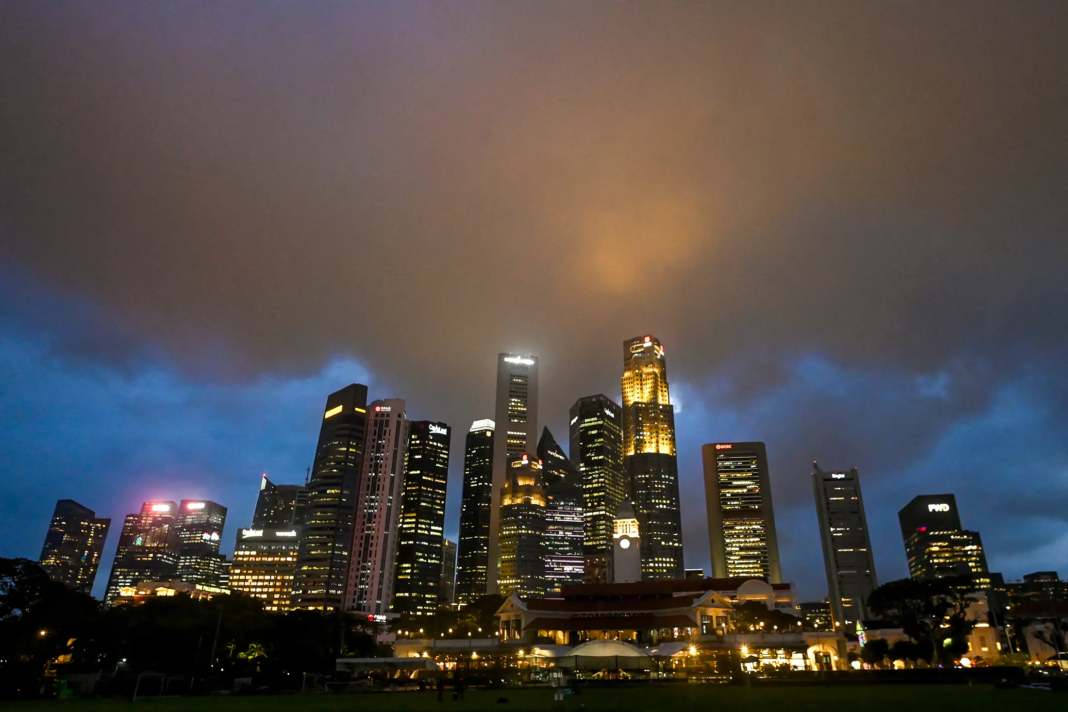 Rain clouds hover over the skyline of Singapore on Jan. 14.