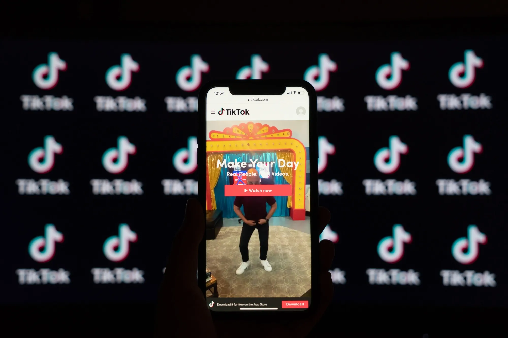 The website for the TikTok app is displayed on a smartphone in Beijing on Sept. 2.