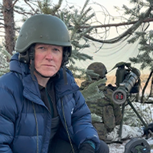 This is a stylized video tout image with a cropped photo of columnist Liam Denning next to text. Text says "Bloomberg Opinion Video Inside Finland's Arctic War Games Against Russia with Liam Denning Watch now"