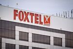 The Foxtel logo is displayed at the company's headquarters in Sydney, Australia, on Thursday, June 21, 2012. Rupert Murdoch's News Corp. offered A$2 billion ($2 billion) to double its stake in Australia's biggest pay-television network Foxtel and will cut newspaper jobs as it shifts to more profitable broadcasting.