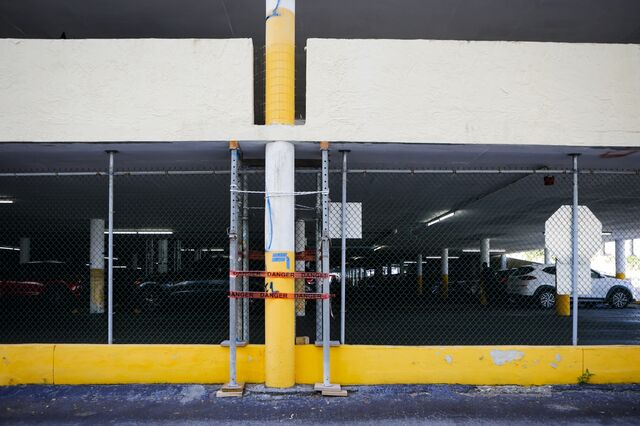a close-up shot of a support column of a parking garage