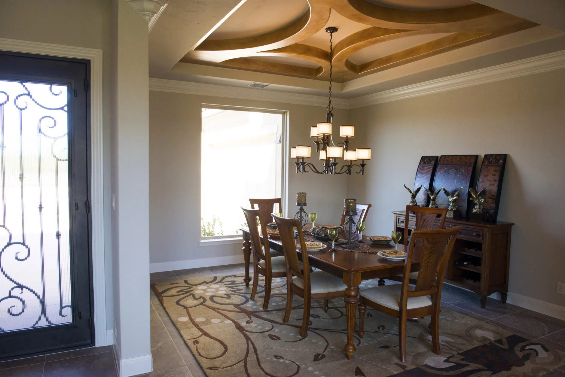 A dining room table set stands in a home for sale in the Andalucia neighborhood of The Dominion gated community in San Antonio, Texas.