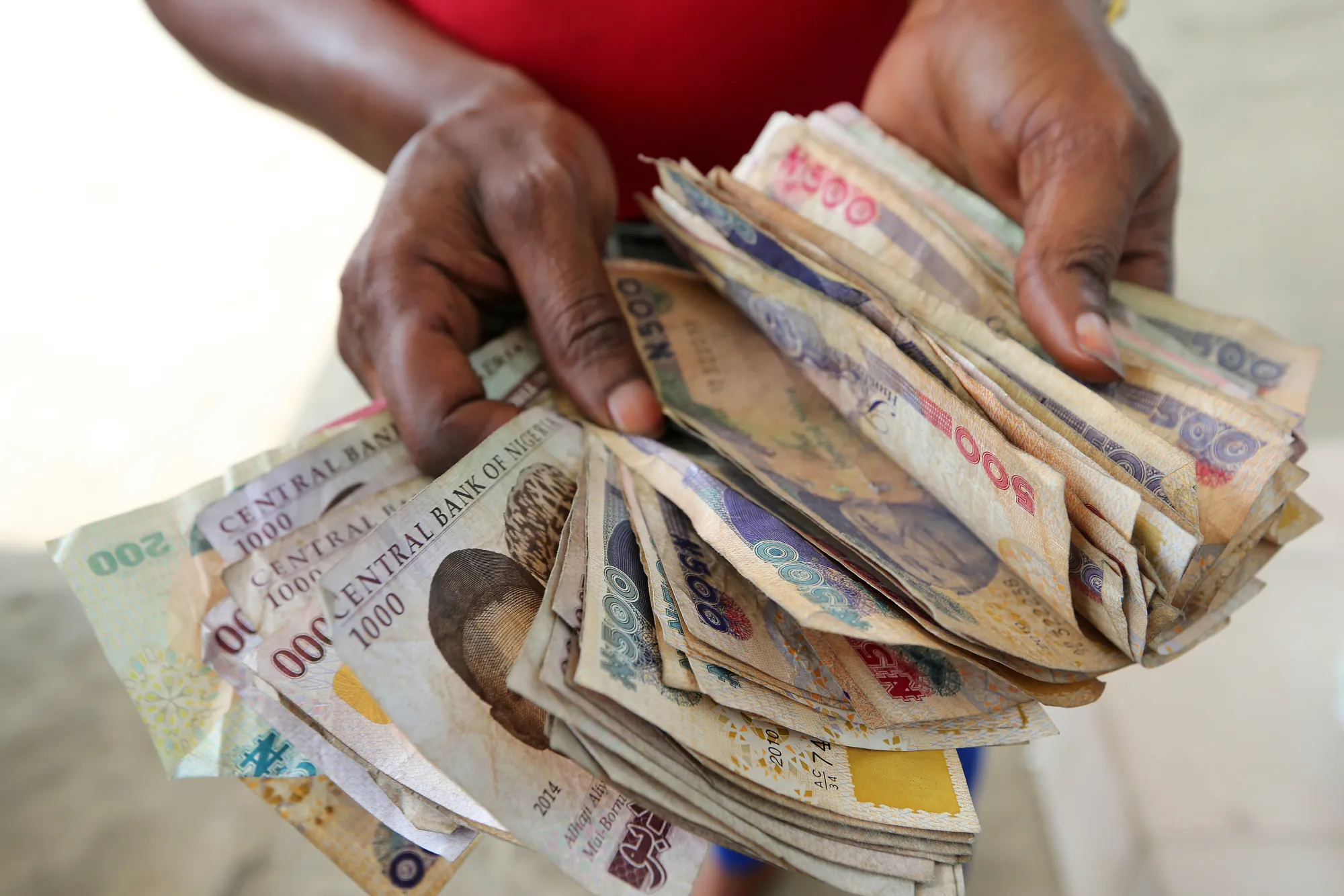 Naira banknotes&nbsp;in Port Harcourt, Nigeria.