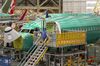 A Boeing Co. 737 Max airplane sits on the production line at the company's manufacturing facility in Renton, Washington, U.S., on Wednesday, March 27, 2019. Boeing said it was agonizingly close to a software fix for its 737 Max jetliner when an Ethiopian Airlines jet plunged to the ground March 10, the second deadly crash in less than five months.