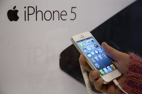 Apple May Face First Profit Drop in Decade as IPhone Slows