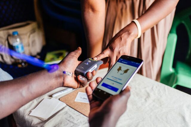 Health worker enrolling a patient in Rwibaale Uganda.