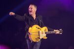 Bryan Adams performs during the Invictus Games closing ceremony in Toronto, on Sept. 30, 2017. Adams, R.E.M., Blondie, Snoop Dogg, Gloria Estefan, Heart and The Doobie Brothers are among the nominees for the 2023 Songwriters Hall of Fame. (Chris Young/The Canadian Press via AP, File)