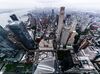 The Manhattan skyline is from windows on the 76th floor of the 3 World Trade Center (WTC) building during a tour in New York, U.S., on Tuesday, May 22, 2018. 3 World Trade Center is slated to open June 6 and will feature 2.5 million rentable square feet of space, 64 foot high office lobby, and 150,000 square feet of retail on five floors.