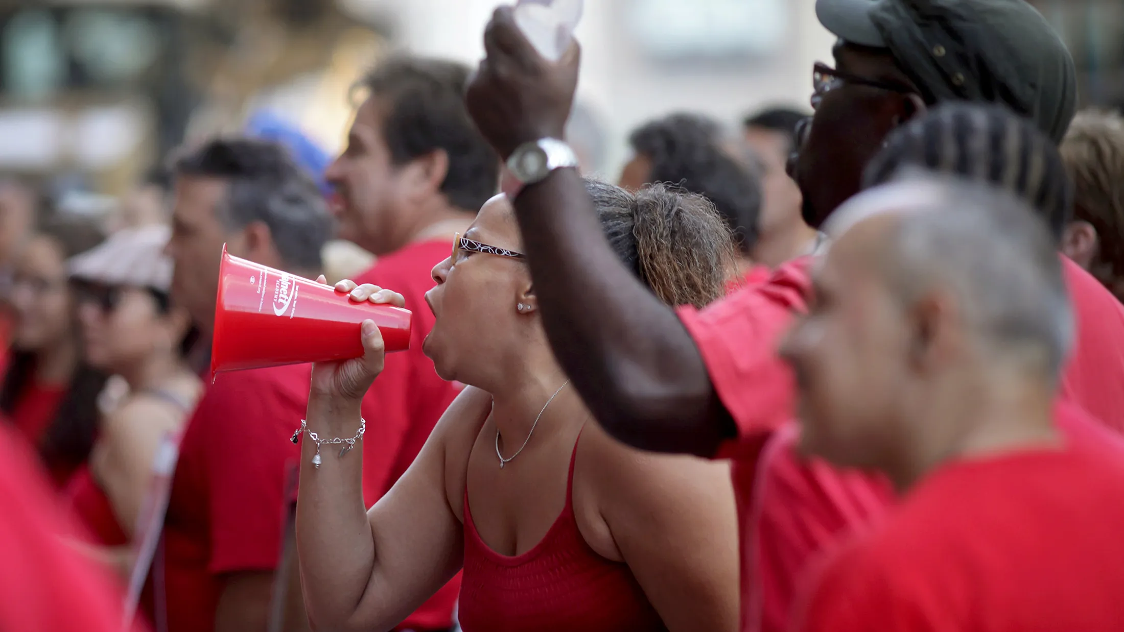 Verizon employees stand on the picket line in front of the company's corporate office in New York, on Aug. 8, 2011.
