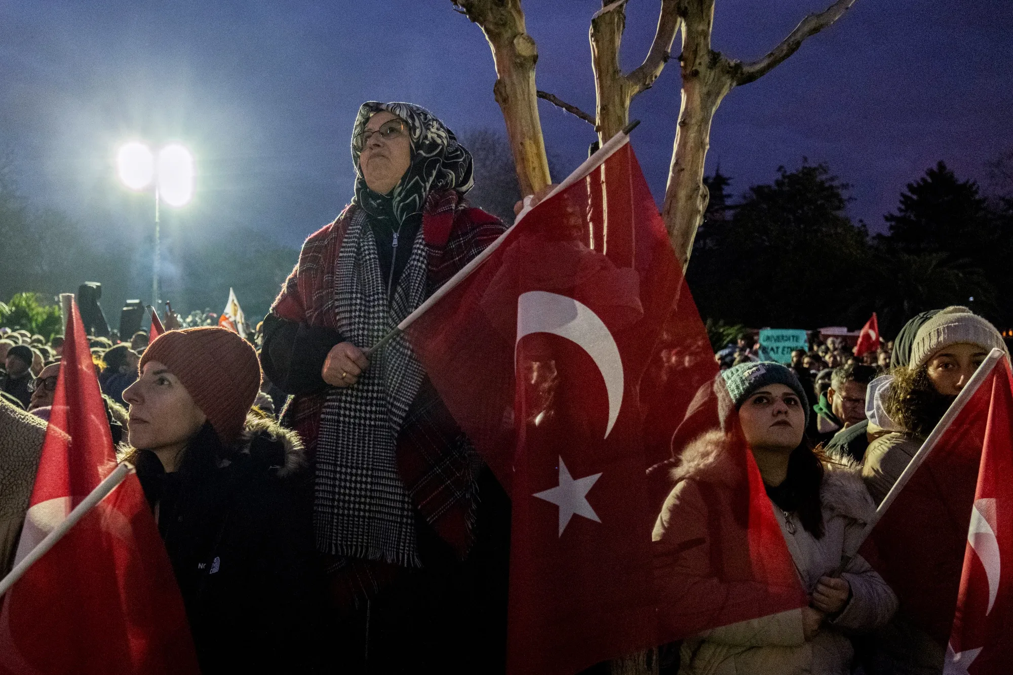 Protestors hold Turkish flags during a demonstration following the detention of Ekrem Imamoglu, mayor of Istanbul, on March 20.