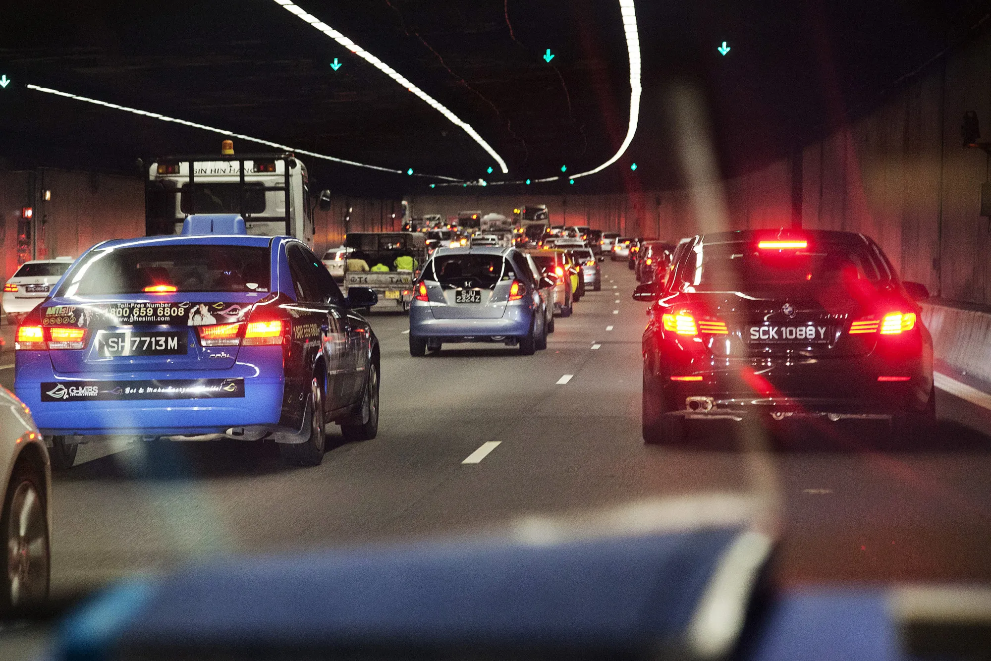 Vehicles travel through a tunnel on the Central Expressway&nbsp;in Singapore.
