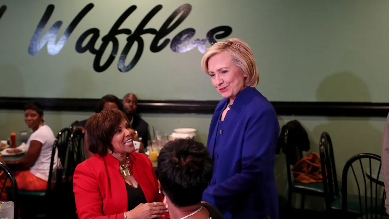 Democratic Presidential Candidate Hillary Clinton greets people as she visits the Kikis Chicken and Waffles restaurant on May 27, 2015 in Columbia, South Carolina. Hillary Clinton continues to campaign throughout the country for the Democratic nomination.
