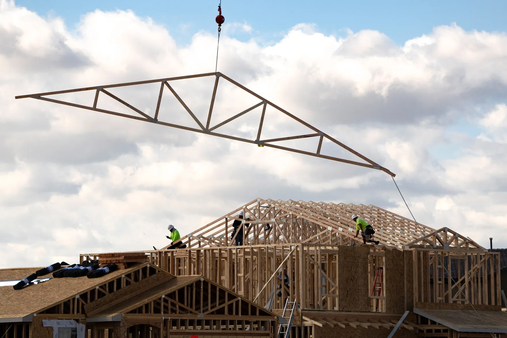 Workers at a home under construction in Tucson, Arizona.