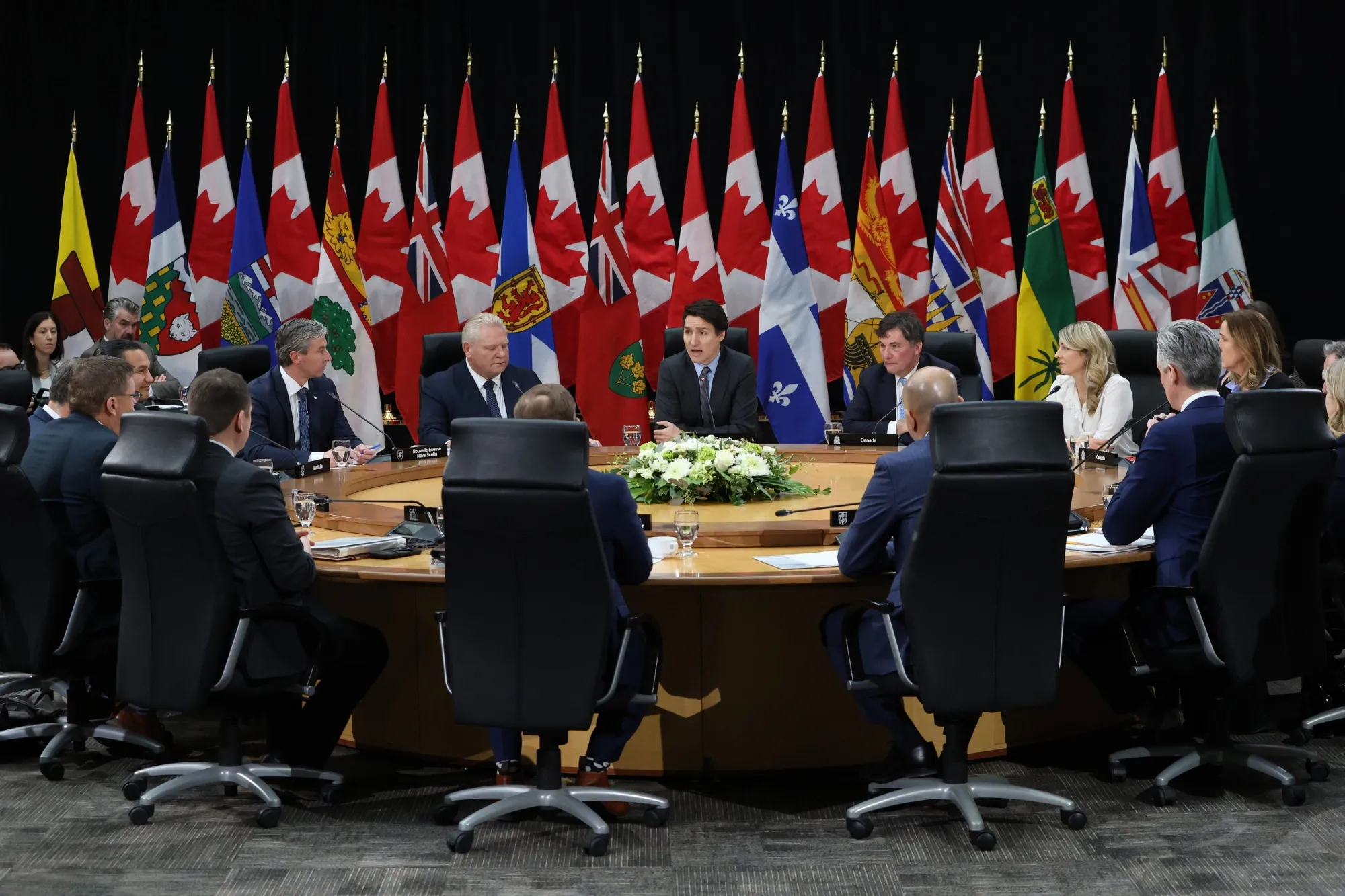 Justin Trudeau, center, gathered Canada’s First Ministers in Ottawa Wednesday to discuss a unified response to US tariff threats. &nbsp;