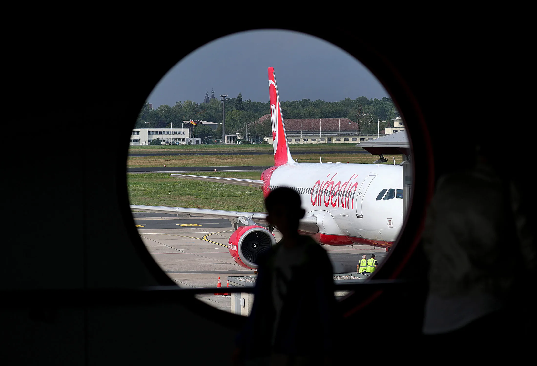 A passenger aircraft, operated by Air Berlin Plc, sits on the tarmac at Tegel airport in Berlin, Germany, on Wednesday, Aug. 16, 2017. Air Berlin filed for insolvency after leading shareholder Etihad Airways PJSC withdrew its financial support, marking the second failure of a major European airline in four months after the Persian Gulf carrier pulled the plug on funding Italy’s Alitalia SpA in May.
