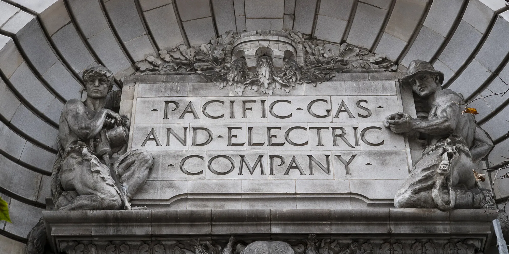Signage is displayed on the exterior of Pacific Gas and Electric Corp. (PG&E) headquarters in San Francisco, California.