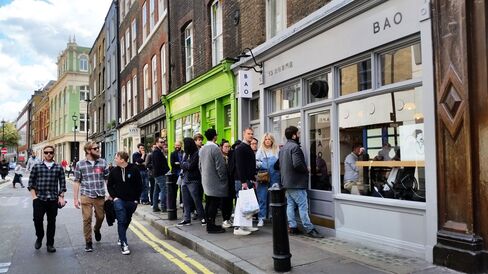 Diners line up for lunch outside Bao, in London's Soho.