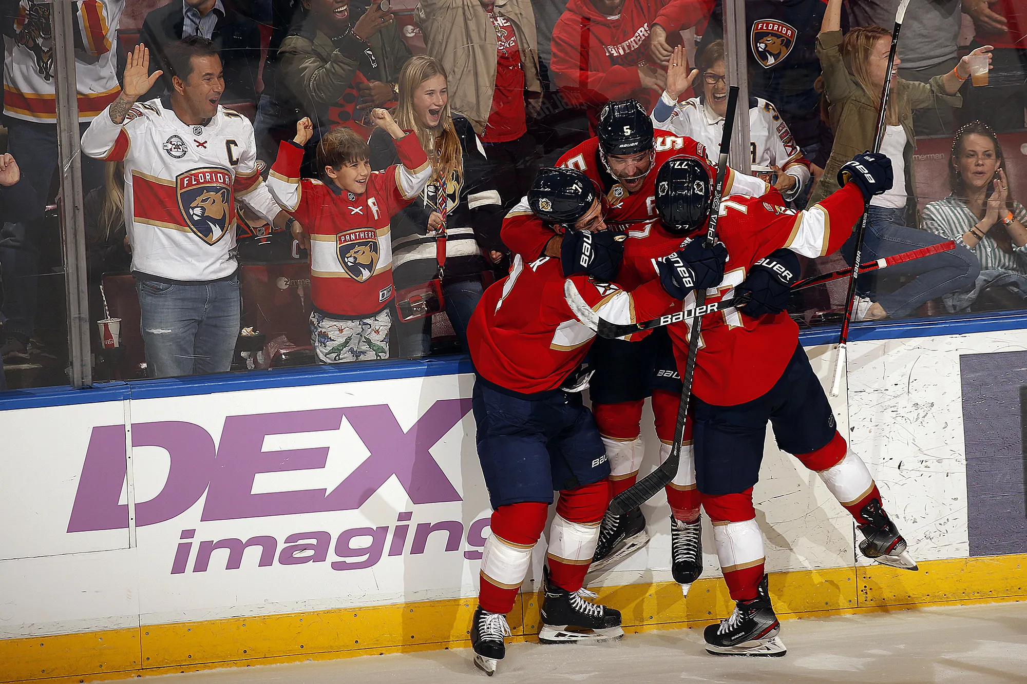 Florida Panthers teammates after scoring in overtime for a&nbsp;win during a game in Sunrise, Florida in 2019.