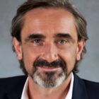 Headshot of Julian Dunkerton