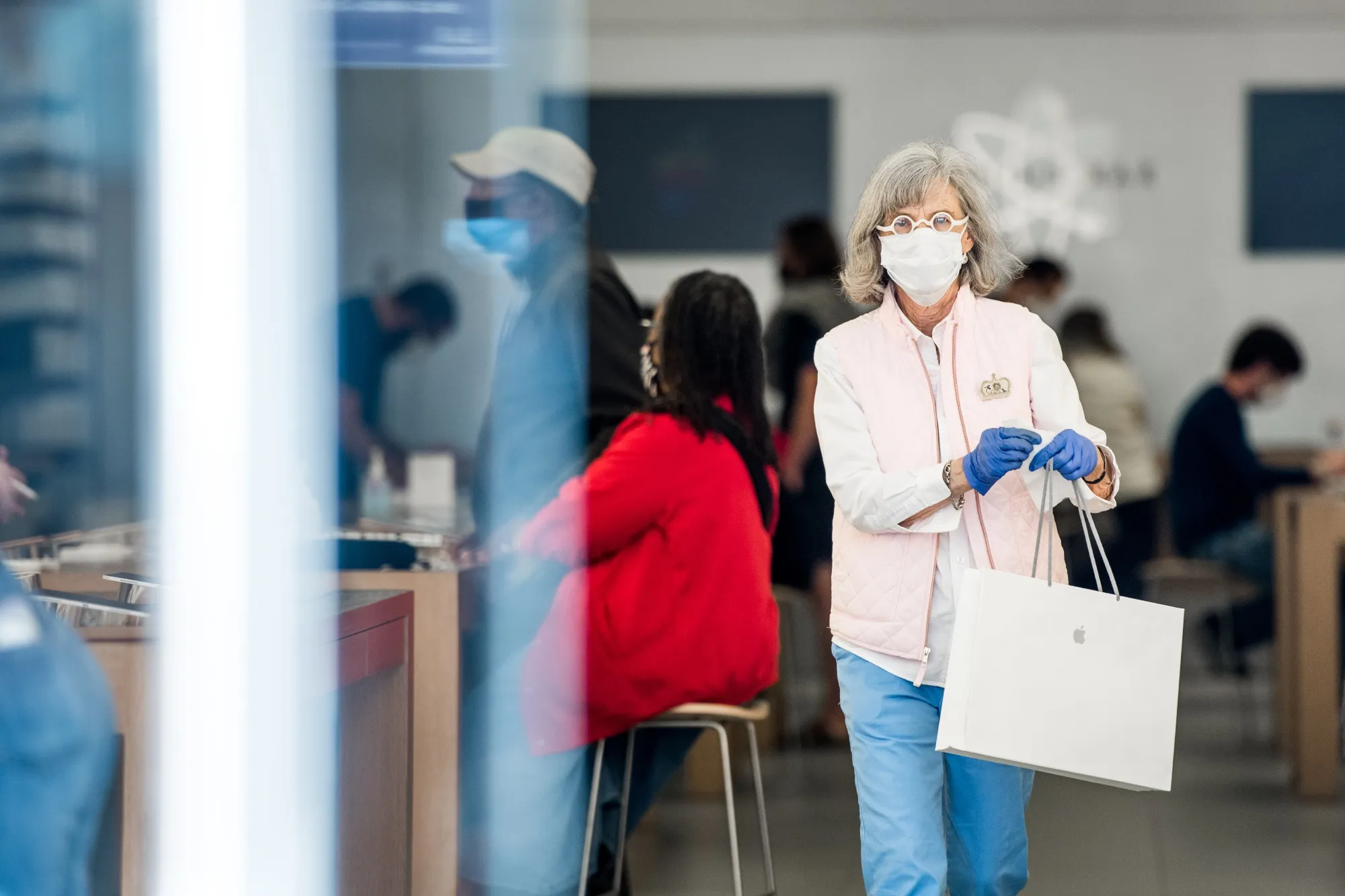 A customer exits the Apple Store on May 13, 2020 in Charleston, South Carolina.
