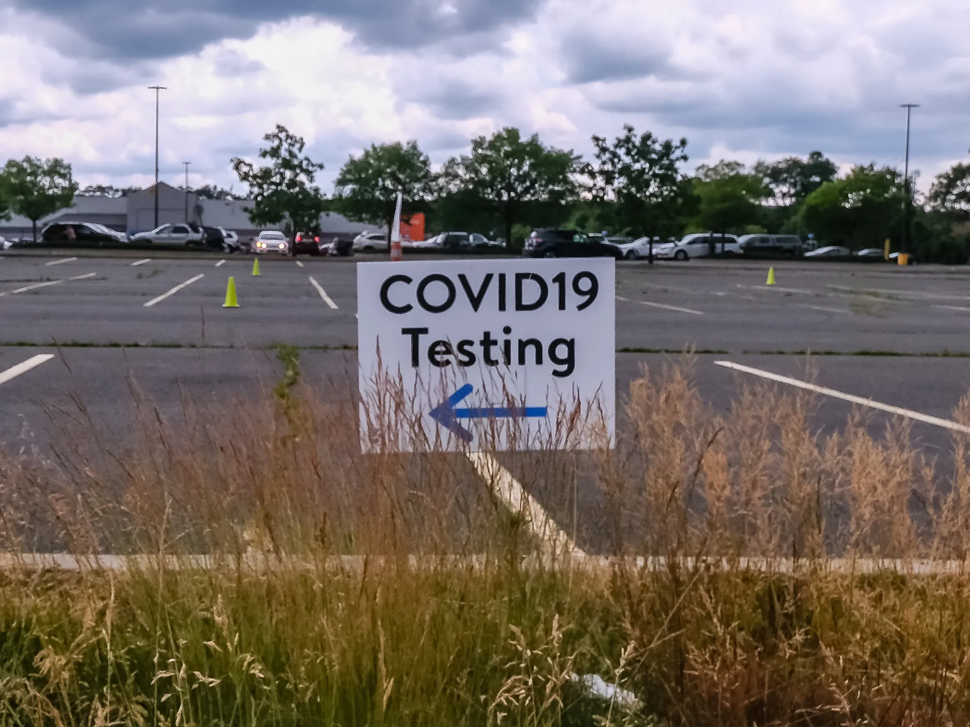 A Covid-19 test sign at a Walmart parking lot in Milford, Pennsylvania, U.S.
