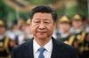 China's President Xi Jinping reviews a military honour guard during a welcome ceremony at the Great Hall of the People in Beijing on December 12, 2018.