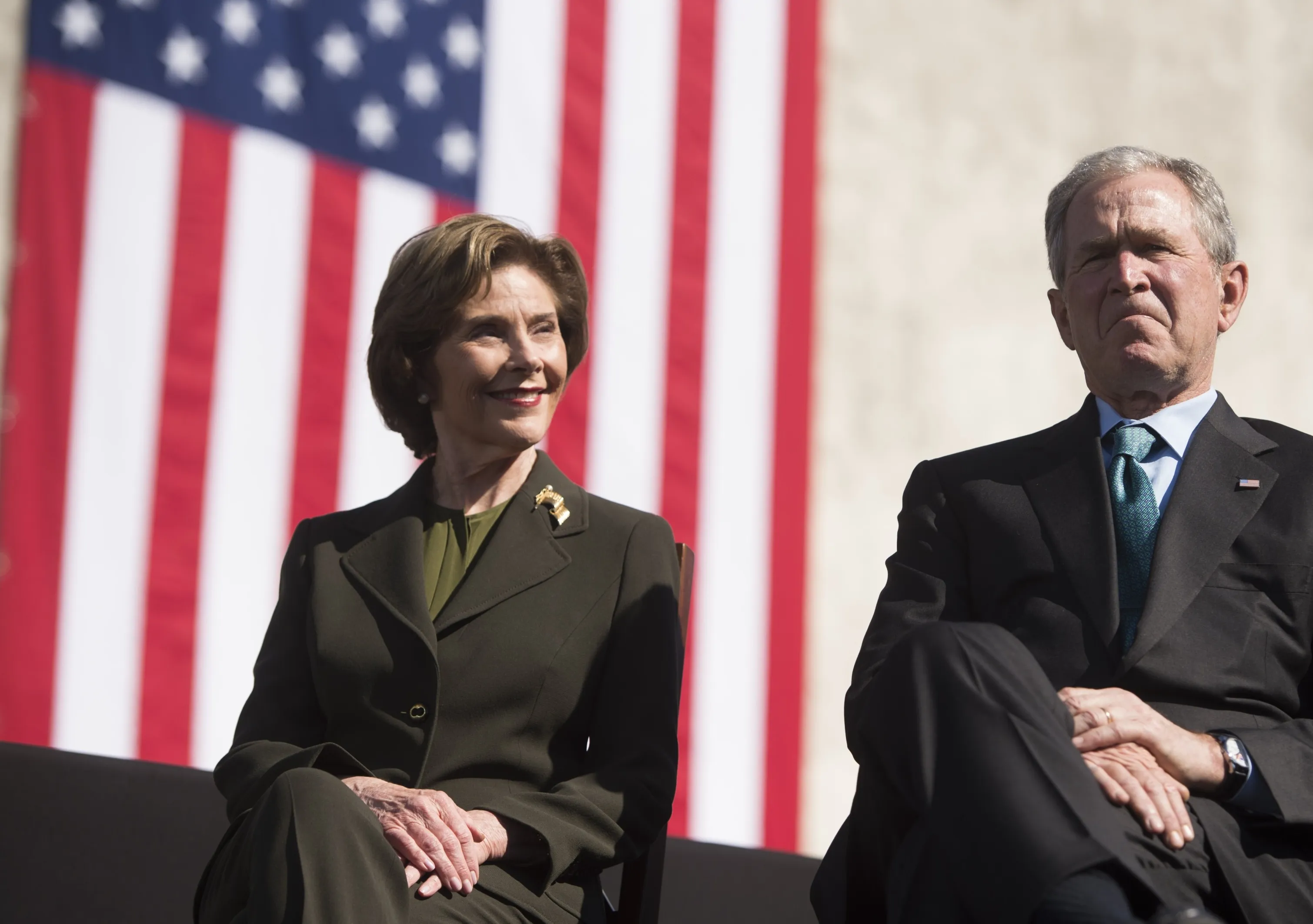 Former US President George W. Bush and First Lady Laura Bush look on during an event marking the 50th Anniversary of the Selma to Montgomery civil rights marches at the Edmund Pettus Bridge in Selma, Alabama, on March 7, 2015.
